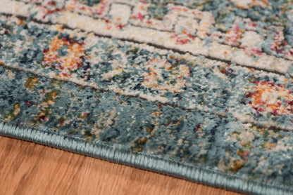 9' X 12' Blue Orange And Ivory Oriental Stain Resistant Area Rug