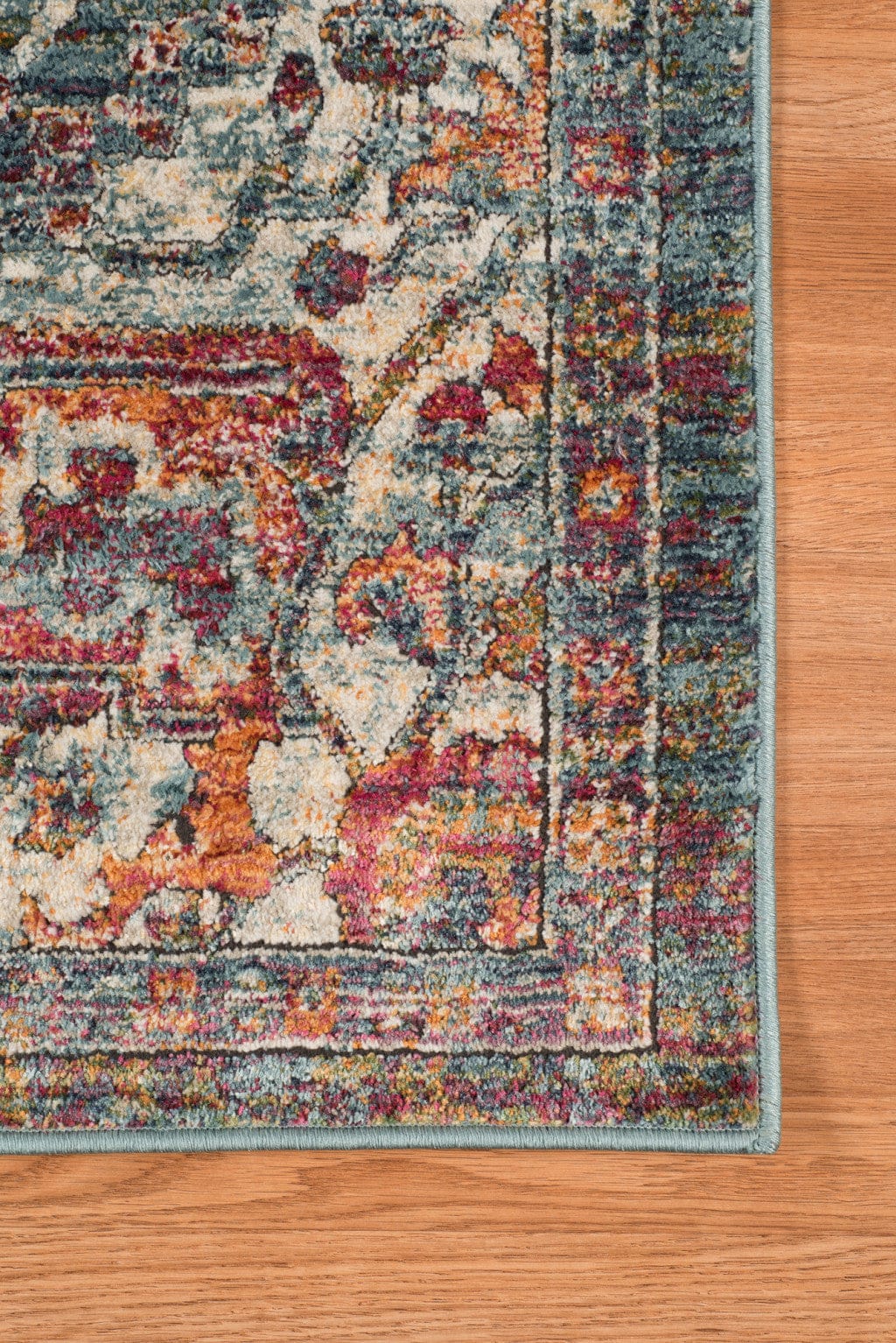 9' X 12' Blue Orange And Ivory Oriental Stain Resistant Area Rug