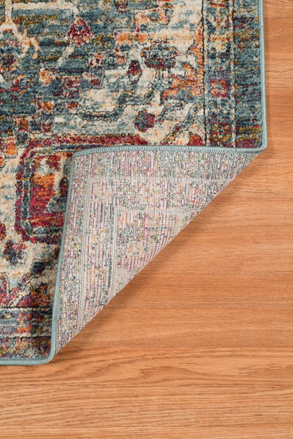 9' X 12' Blue Orange And Ivory Oriental Stain Resistant Area Rug