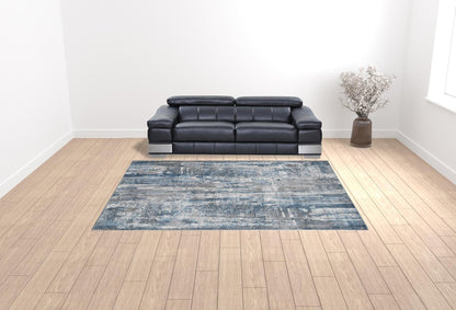 9' X 12' Blue Ivory And Gray Abstract Area Rug