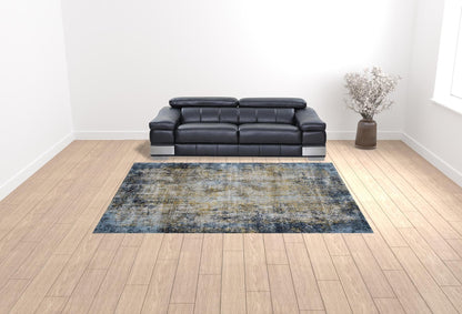 9' X 12' Blue And Gold Abstract Area Rug