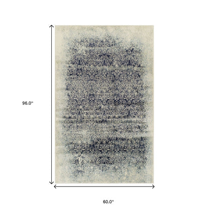 5' X 8' Navy Blue Medallion Stain Resistant Area Rug