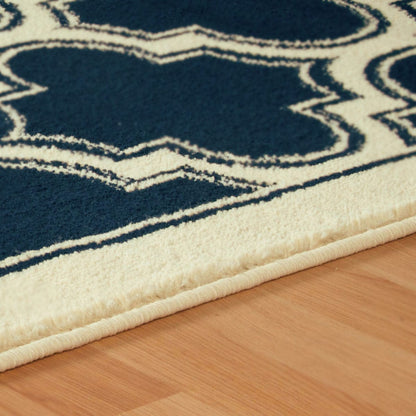 8' Dark Blue And Cream Geometric Stain Resistant Runner Rug
