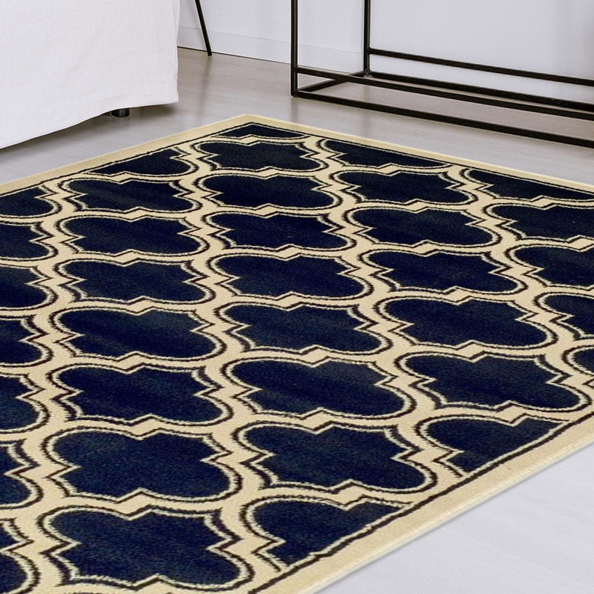 5' X 8' Dark Blue And Cream Geometric Stain Resistant Area Rug