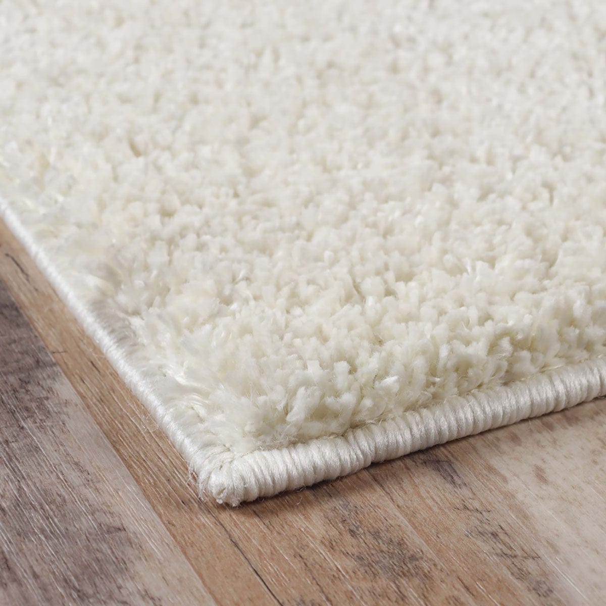 8' X 10' Ivory Shag Stain Resistant Area Rug