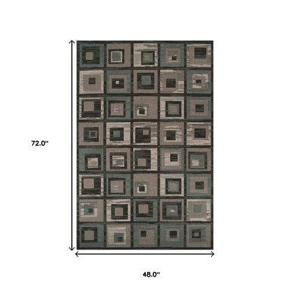 4' X 6' Color Block Beige And Teal Checkered Stain Resistant Area Rug