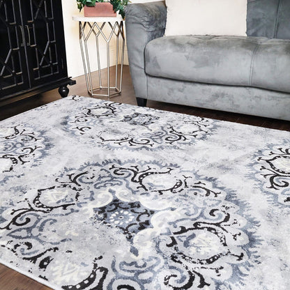 5' X 8' Silver And Gray Geometric Medallion Stain Resistant Area Rug