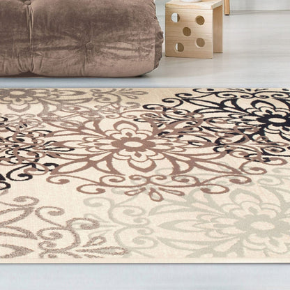 4' X 6' Tan Gray And Black Floral Medallion Stain Resistant Area Rug
