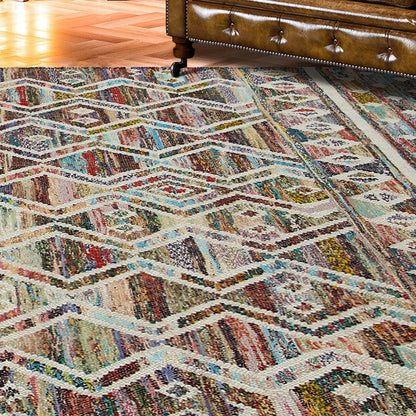 8' X 10' Ivory Blue Pink Gold And Green Geometric Hand Woven Area Rug With Fringe