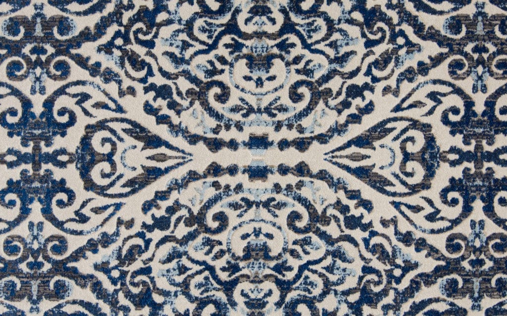 2' X 4' Blue Ivory And Black Floral Distressed Stain Resistant Area Rug