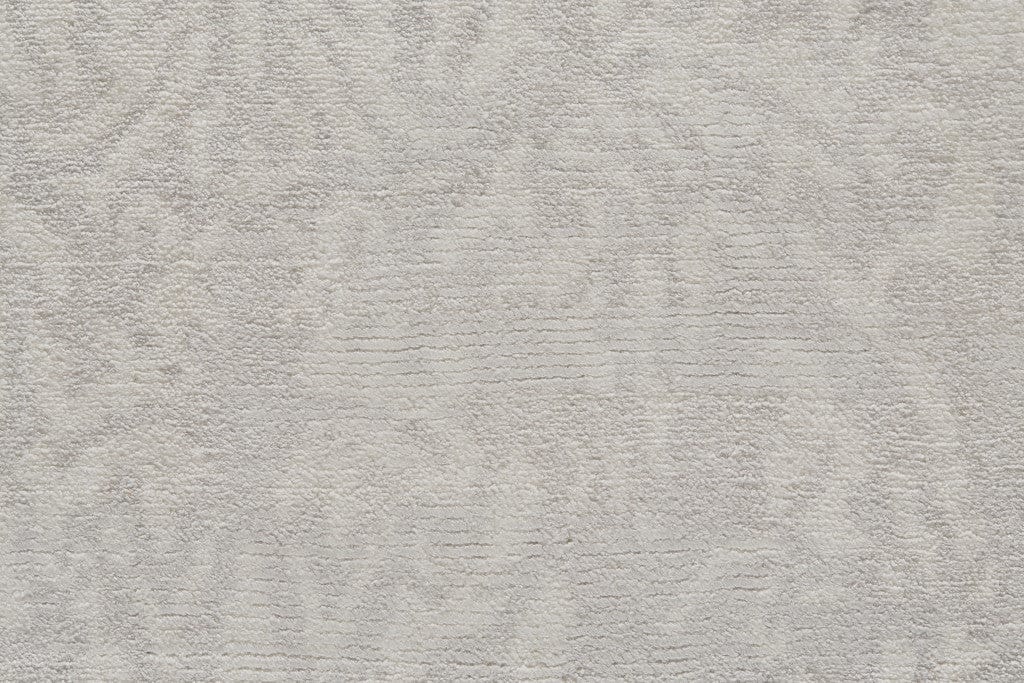 5' X 8' Ivory Gray And Tan Abstract Hand Woven Area Rug
