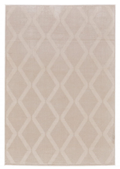 5' X 8' Ivory And Tan Geometric Stain Resistant Area Rug