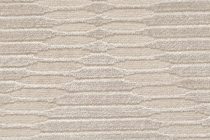 5' X 8' Ivory And Tan Geometric Stain Resistant Area Rug