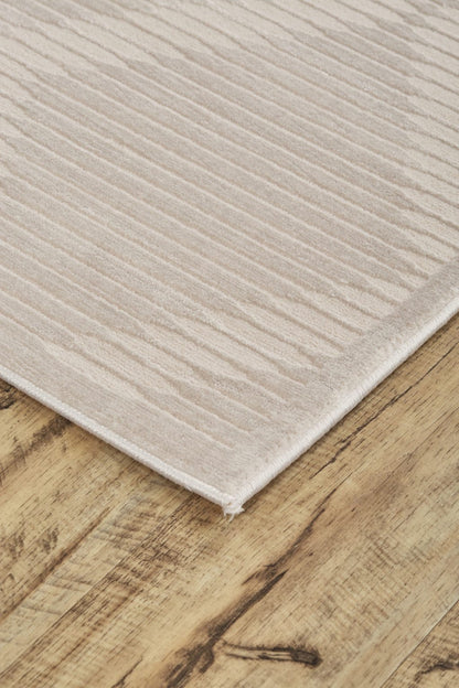 5' X 8' Ivory And Tan Geometric Stain Resistant Area Rug