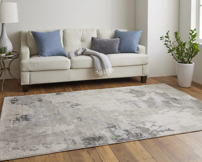 5' X 8' Ivory And Gray Abstract Stain Resistant Area Rug