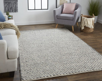 4' X 6' Gray And Ivory Wool Floral Hand Woven Stain Resistant Area Rug