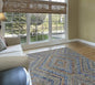 8' X 11' Blue Brown And Orange Wool Geometric Tufted Handmade Stain Resistant Area Rug