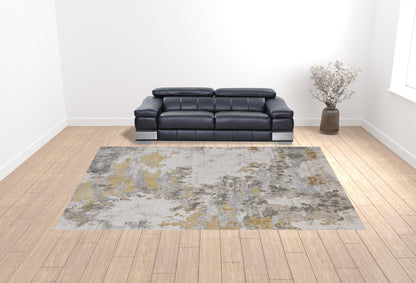 5' X 8' Ivory Gold And Gray Abstract Stain Resistant Area Rug