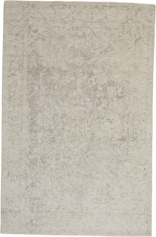 5' X 8' Ivory And Tan Abstract Hand Woven Area Rug