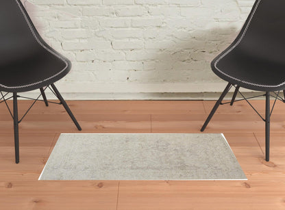 5' X 8' Ivory And Tan Abstract Hand Woven Area Rug