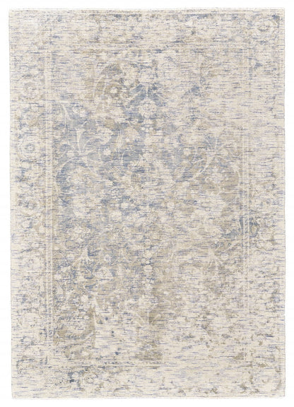5' X 8' Ivory And Tan Abstract Hand Woven Area Rug