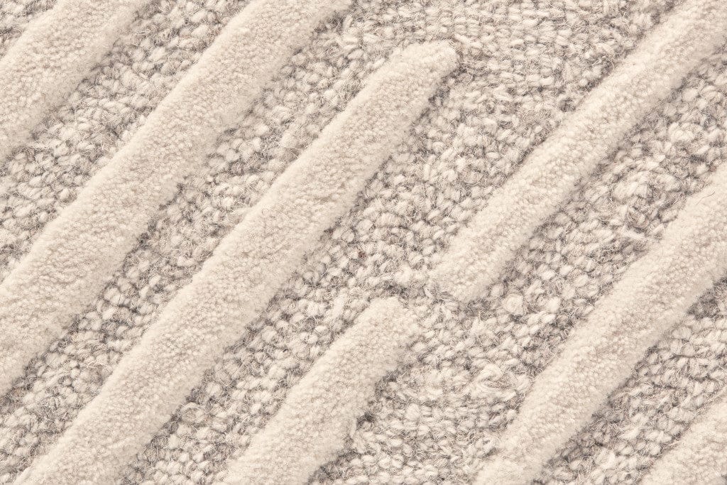 5' X 8' Tan And Ivory Wool Geometric Tufted Handmade Stain Resistant Area Rug