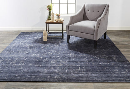 4' X 6' Blue And Ivory Abstract Hand Woven Area Rug