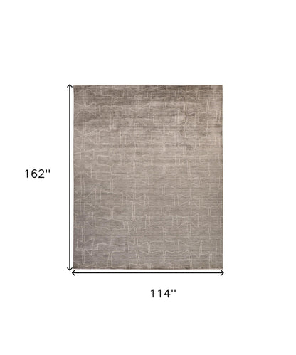 4' X 6' Gray Taupe And Ivory Abstract Hand Woven Area Rug