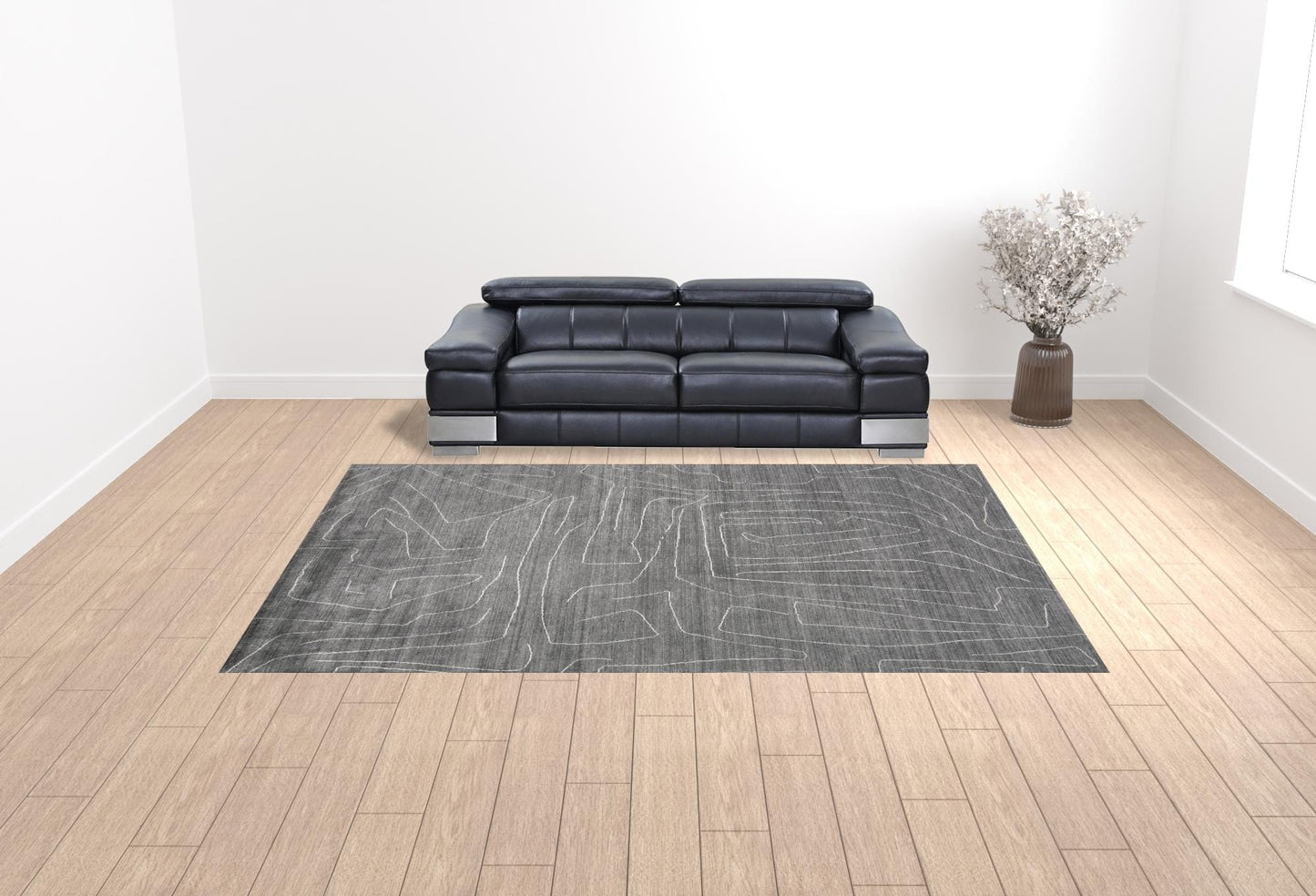 5' X 8' Gray And Ivory Abstract Hand Woven Area Rug