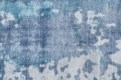 5' X 8' Blue And Ivory Abstract Hand Woven Area Rug