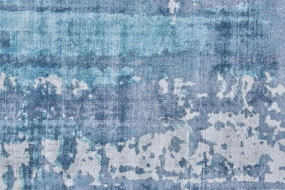 5' X 8' Blue And Ivory Abstract Hand Woven Area Rug