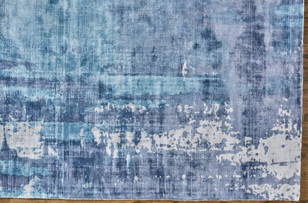 5' X 8' Blue And Ivory Abstract Hand Woven Area Rug