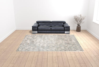 4' X 6' Ivory Gray And Taupe Abstract Stain Resistant Area Rug