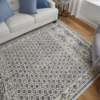 4' X 6' Ivory Taupe And Gray Abstract Stain Resistant Area Rug