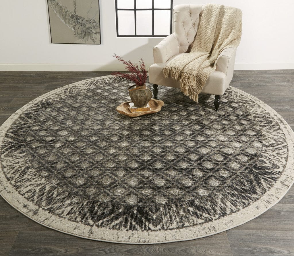4' X 6' Ivory Black And Taupe Abstract Stain Resistant Area Rug