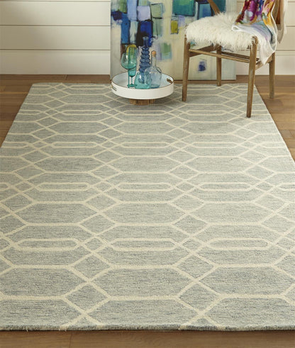 5' X 8' Blue And Ivory Wool Geometric Tufted Handmade Stain Resistant Area Rug