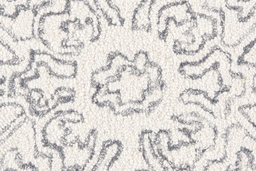 5' X 8' Ivory And Brown Wool Floral Tufted Handmade Stain Resistant Area Rug