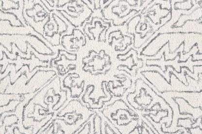 5' X 8' Ivory And Brown Wool Floral Tufted Handmade Stain Resistant Area Rug