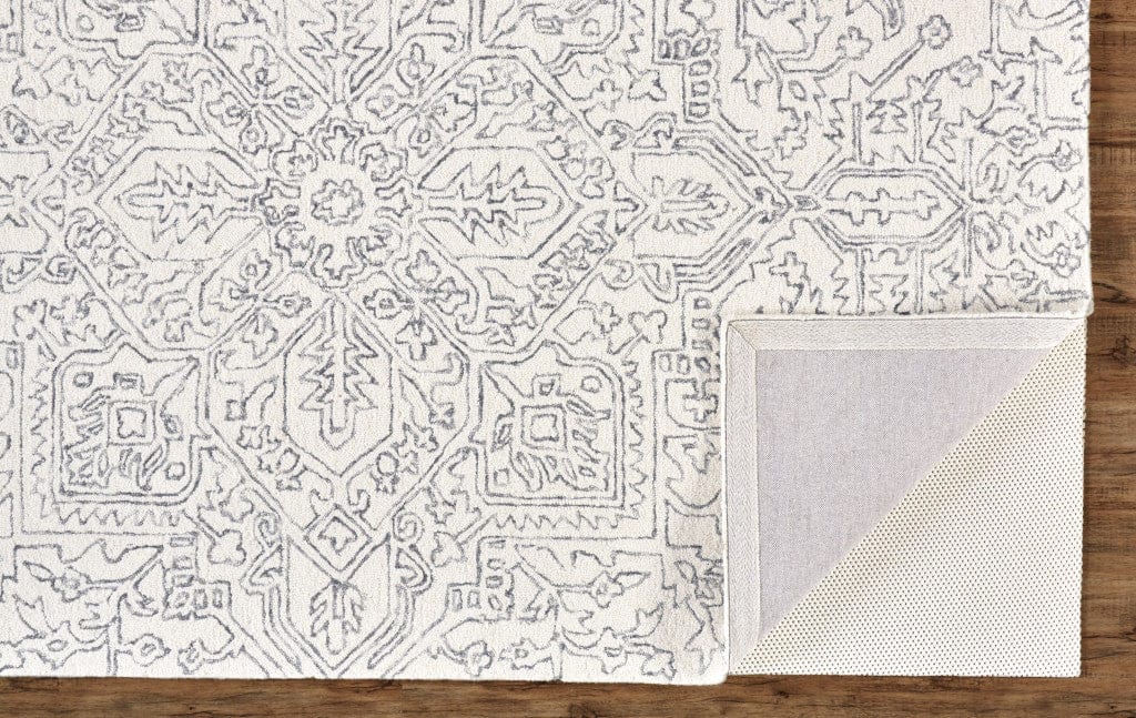 5' X 8' Ivory And Brown Wool Floral Tufted Handmade Stain Resistant Area Rug