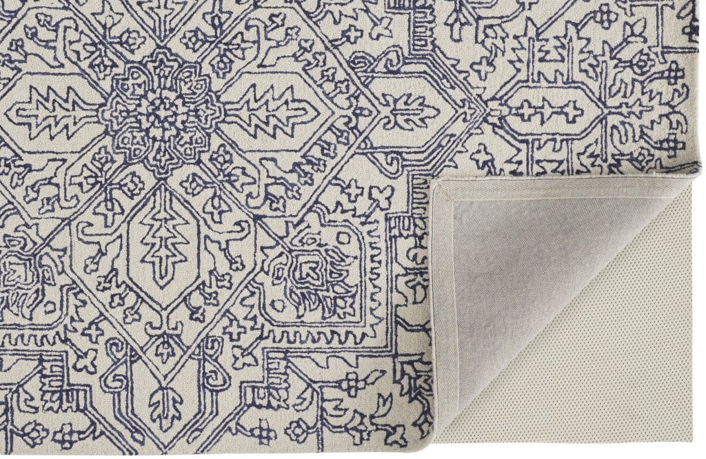 5' X 8' Ivory And Brown Wool Floral Tufted Handmade Stain Resistant Area Rug