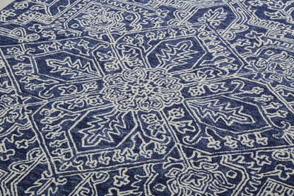 5' X 8' Ivory And Brown Wool Floral Tufted Handmade Stain Resistant Area Rug