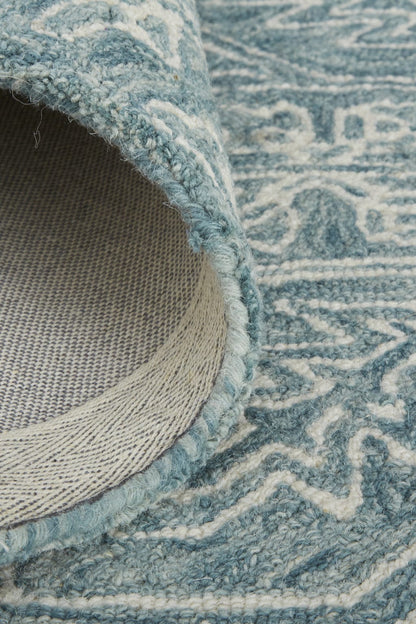 5' X 8' Ivory And Brown Wool Floral Tufted Handmade Stain Resistant Area Rug