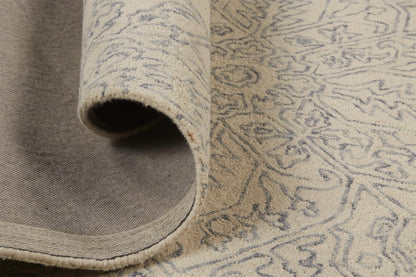 5' X 8' Ivory And Gray Wool Floral Tufted Handmade Stain Resistant Area Rug