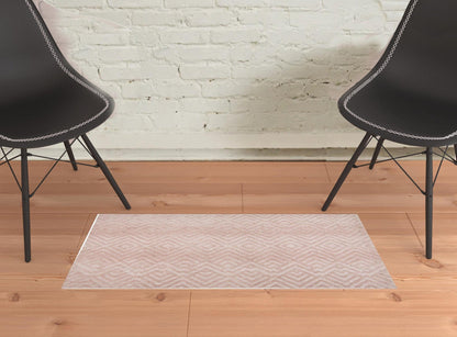 4' X 6' Pink And Ivory Geometric Stain Resistant Area Rug