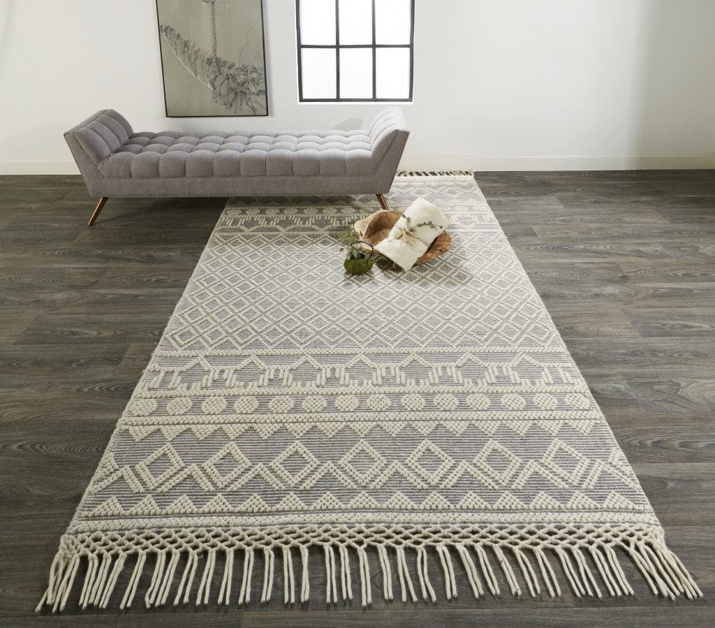 4' X 6' Gray And Ivory Wool Geometric Hand Woven Area Rug With Fringe