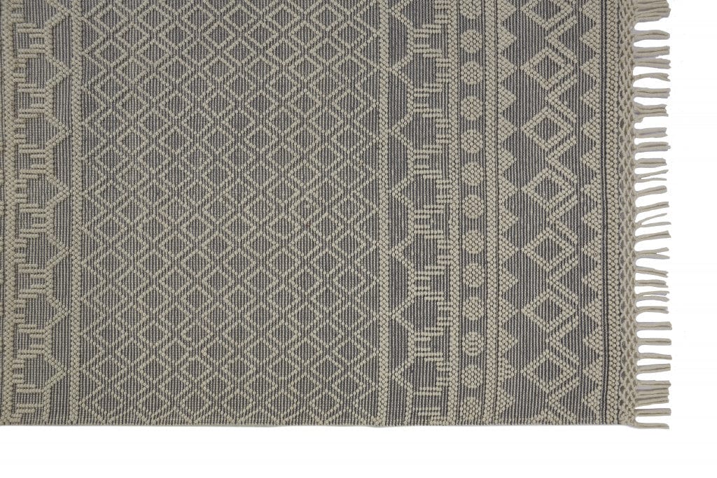 4' X 6' Gray And Ivory Wool Geometric Hand Woven Area Rug With Fringe