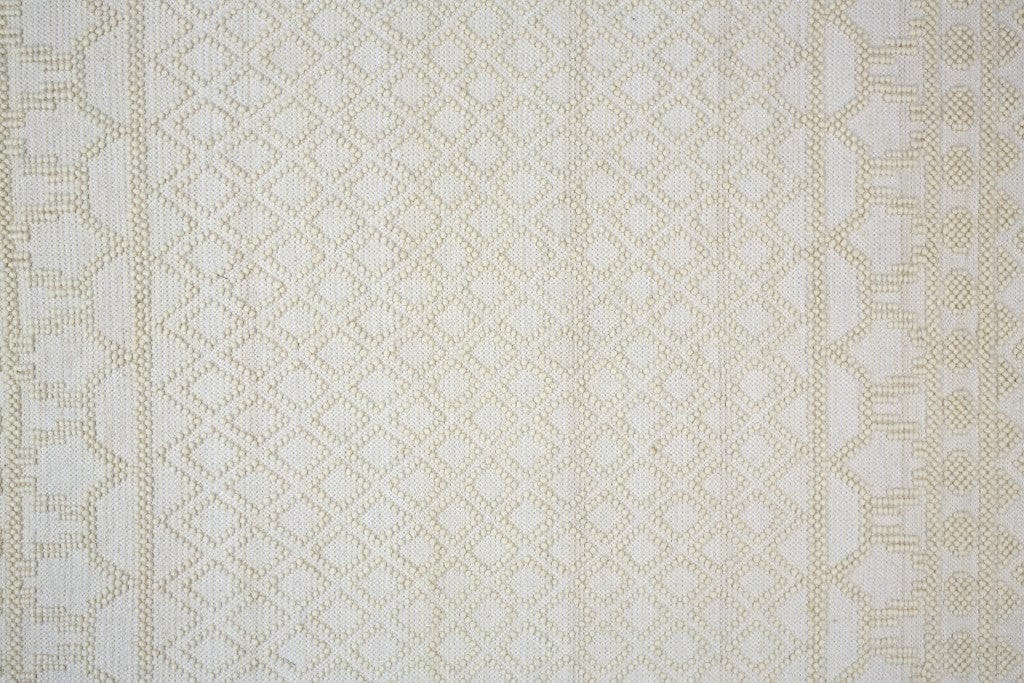 4' X 6' Gray And Ivory Wool Geometric Hand Woven Area Rug With Fringe