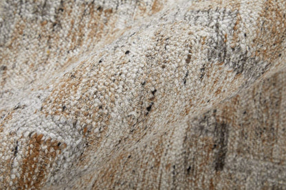 4' X 6' Tan Gray And Ivory Geometric Hand Woven Stain Resistant Area Rug With Fringe