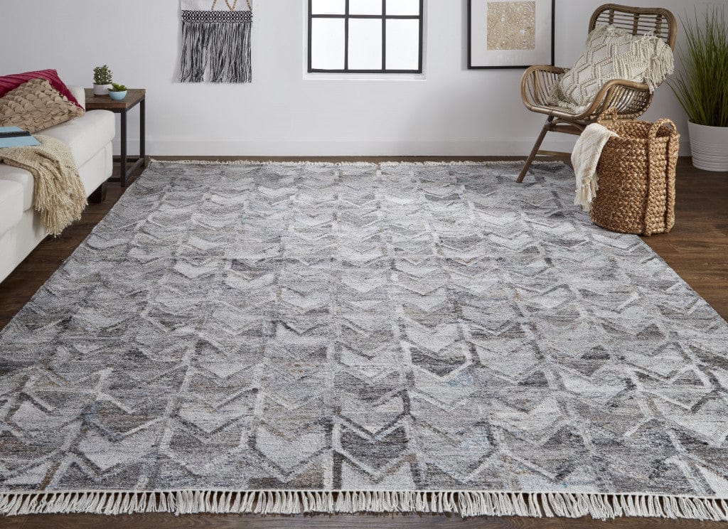 4' X 6' Gray Silver And Taupe Geometric Hand Woven Stain Resistant Area Rug With Fringe
