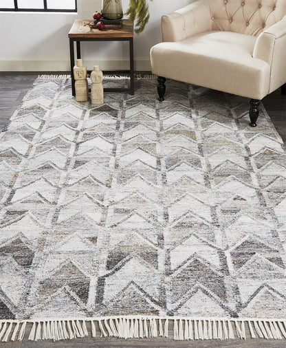4' X 6' Gray Silver And Taupe Geometric Hand Woven Stain Resistant Area Rug With Fringe